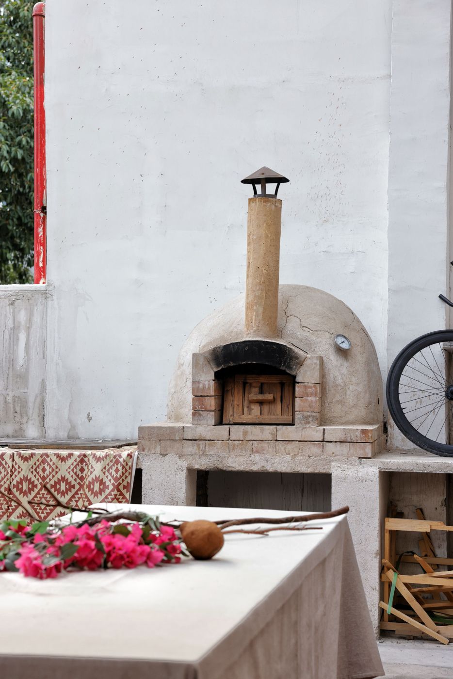 Brick pizza oven built on a solid masonry base